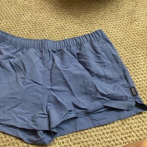Womens Patagonia baggies, low waisted. Periwinkle blue type of color. Size large